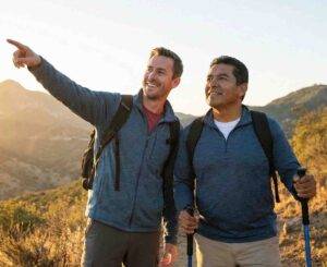 Counseling Services & Specialties 3 Two men hiking and pointing toward mountains for men's issues therapy